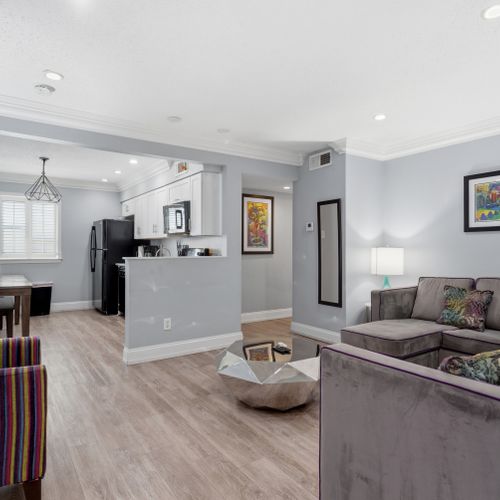 Bright, open kitchen w/ clean lines & polished finishes.