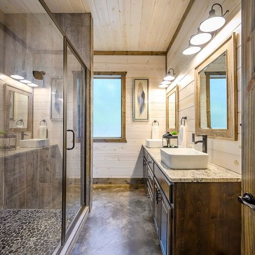 Attached bathroom with walk-in shower and soaking tub.