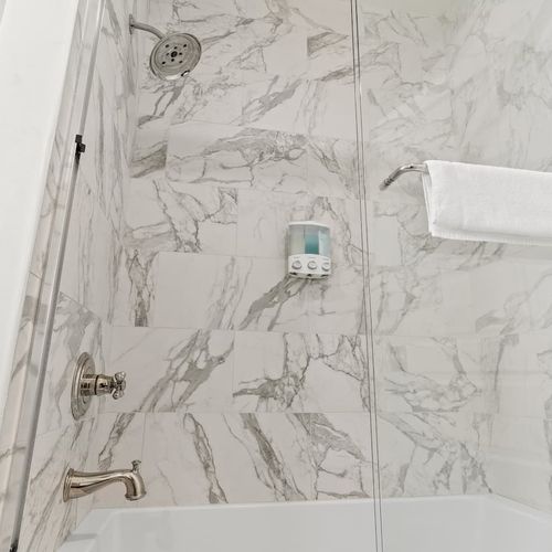 Marble-look flooring detail in the bathroom.