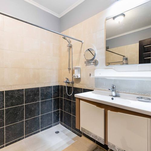 Bathroom with shower and hot water.