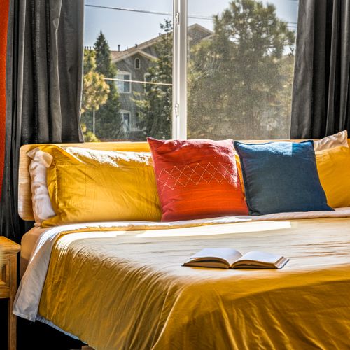 Pops of color and thoughtful design make this room feel lively and curated.