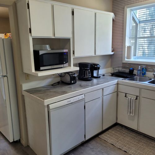 KITCHEN:  Recently updated kitchen with all appliances including a dishwasher and a good supply of cooking and dining utensils.