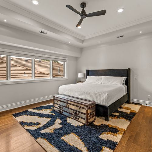 Spotless and spacious, this bedroom is designed for total rest and relaxation.