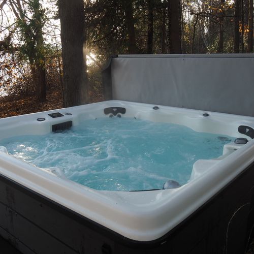 Exterior:  the new year-round hot tub in the backyard.