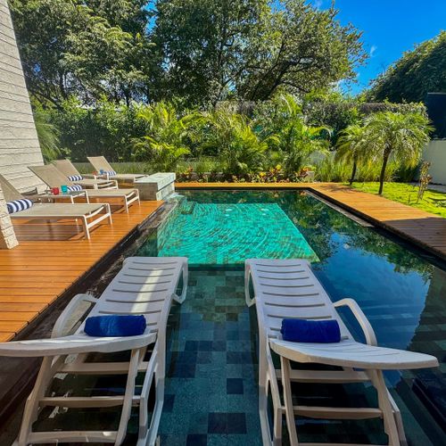 Loungue in pool chairs in the pool