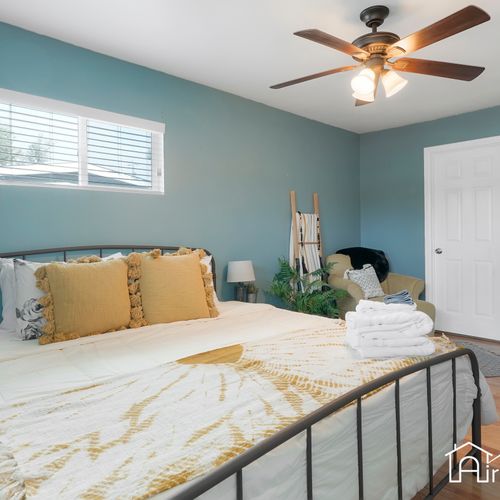 Kick back in the master bedroom, complete with a king-sized bed and walk-in closet.