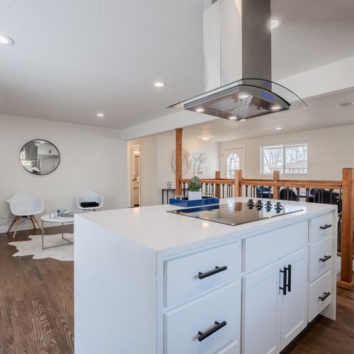 Brand new stainless steel appliances and brand new range are featured in the kitchen.