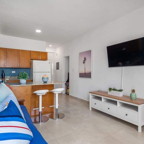 Enjoy your favorite shows on the large screen in this comfortable living area.