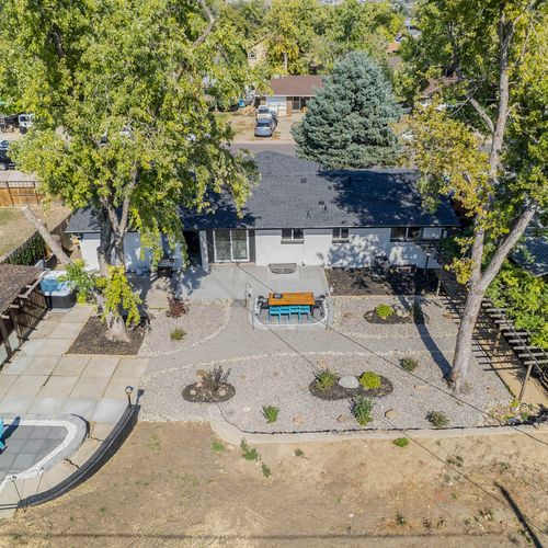 A stunning aerial view highlights the spacious backyard, offering plenty of room for outdoor activities and gatherings.