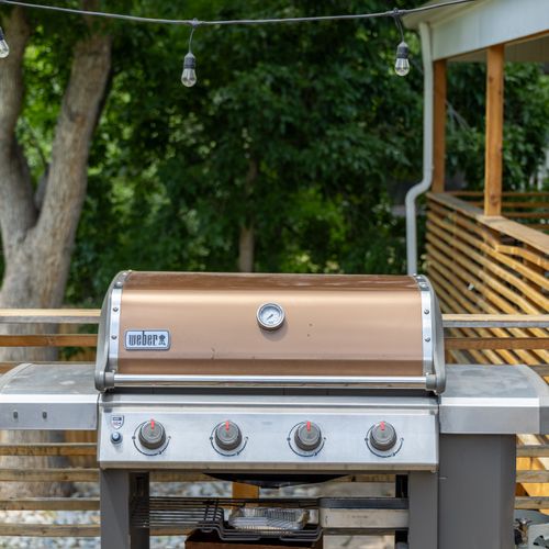 Perfect your grilling game at this stylish, host-ready outdoor setup.