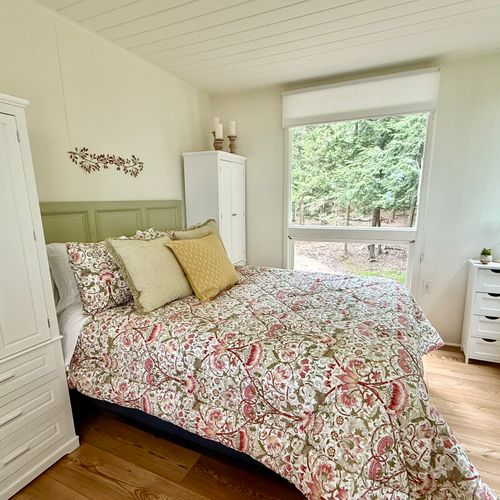 BEDROOM:  The home has a truly gorgeous bedroom with great views of nature, but with blinds on all windows