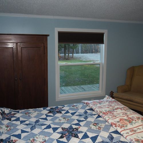 Bedroom #1 (master bedroom):  another angle showing one of the dressers, the window that faces that front yard, and the comfortable chair that is in the room.
