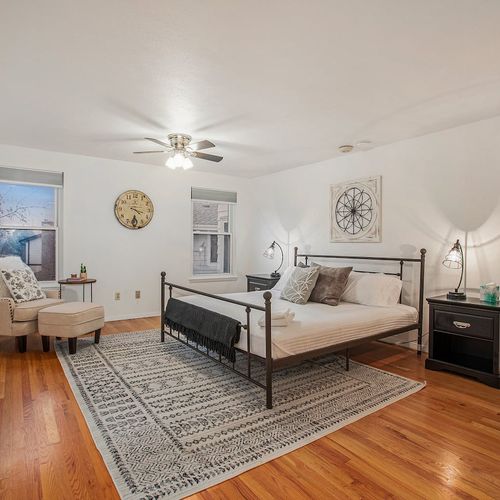 Escape to the peace and tranquility of the master bedroom for a restful slumber.
