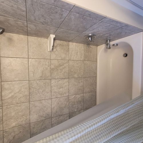 Bathroom #2:  full common bathroom on the main floor with a combination tub and shower.