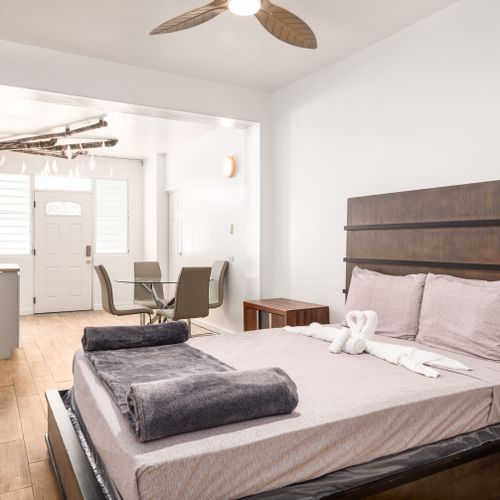 Modern art accent in a stylish bedroom.