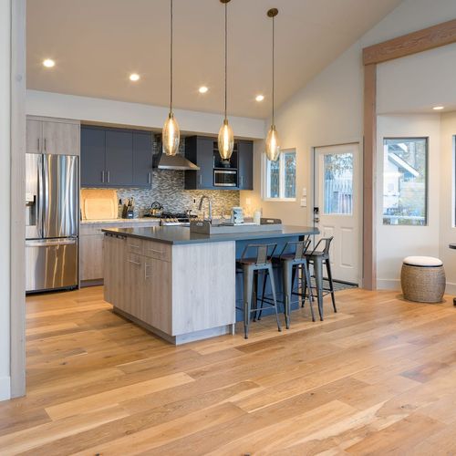 Large open kitchen, breakfast nook that opens to the dining area and views outside.