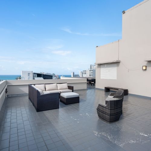 Sunbathe or relax in our stylish rooftop lounge.