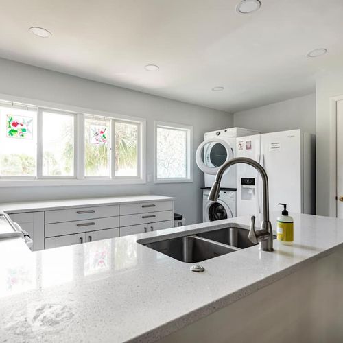 Cook like a pro! A modern and fully-equipped kitchen with stylish quartz countertops.