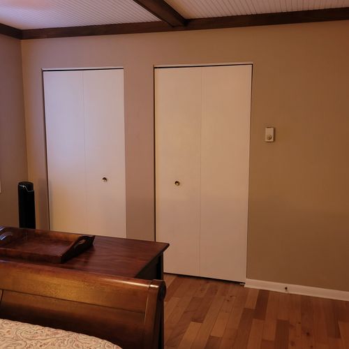 BEDROOM #1 (SECOND FLOOR):  Features a queen-size bed, nightstands, lamps, dresser, mirror, 2 closets, and its own private entrance to the bathroom on the second floor.