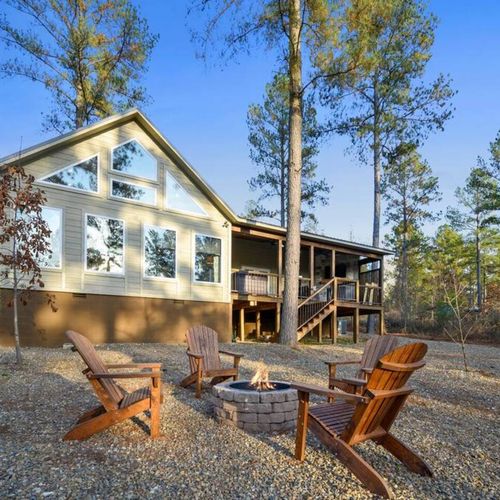 The fire pit with 4 Adirondack chairs!