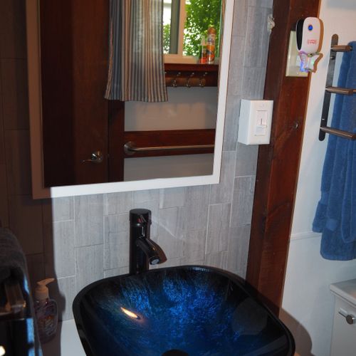 Bathroom:  the cottage has a full bathroom, which includes a combination tub and shower.