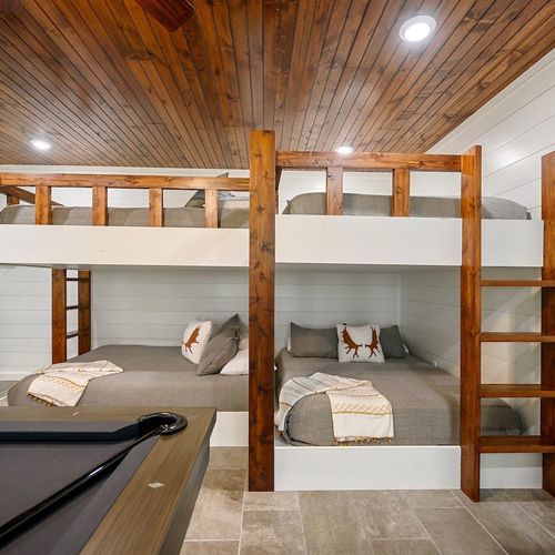 The bunk room is home to 6 Queen beds.