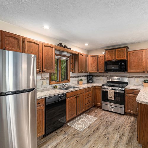 OVERALL:  The lovely kitchen that includes all appliances including a dishwasher