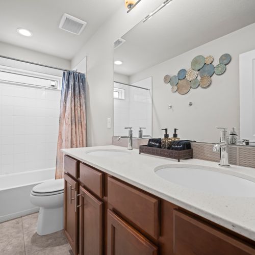 Double-sink setup so mornings feel easy and relaxed.