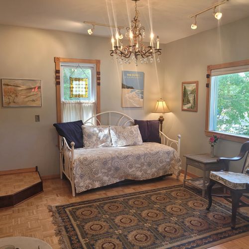 Foyer:  one of the fun and quirky aspects of the home is that in the large front foyer there is a day bed, which include a trundle bed underneath.