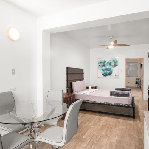 Spacious unit with dedicated dining area.