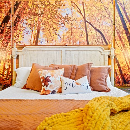 The king sized bed and colorful, plush bedding make this the perfect room for those who want to fall asleep among the colors of the season.