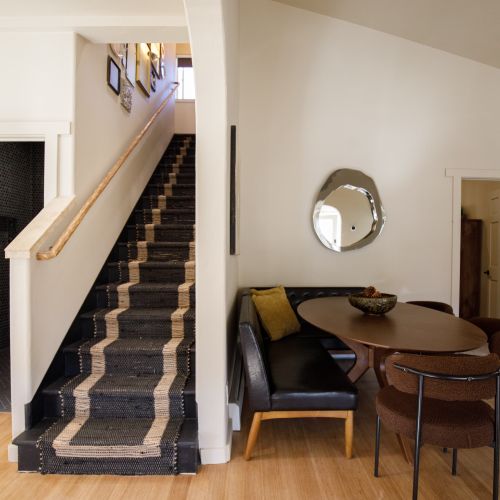 A mirrored stairway to the master suite.