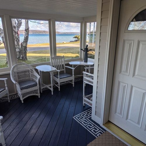 Enclosed front porch:  the home has lovely enclosed front porch with a great view of crystal lake.