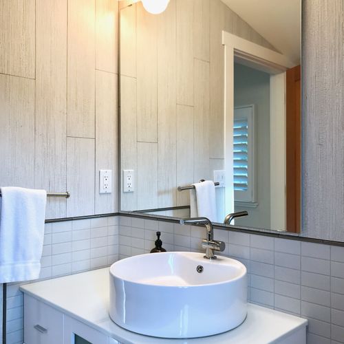 Half bathroom on the upper living room level of the home