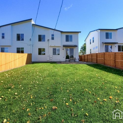 - spacious fenced backyard with a full view of the home and wide open lawn space
- great spot for outdoor games, relaxing under the sun, or hosting a backyard bbq
- clean landscaping and privacy fencing offer peace and comfort for your stay
