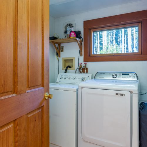 Washer and Dryer in a separate laundry room off of the kitchen