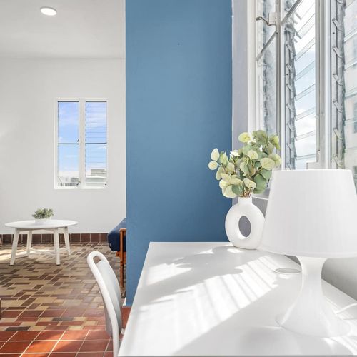 Experience a room that caters to both relaxation and productivity.