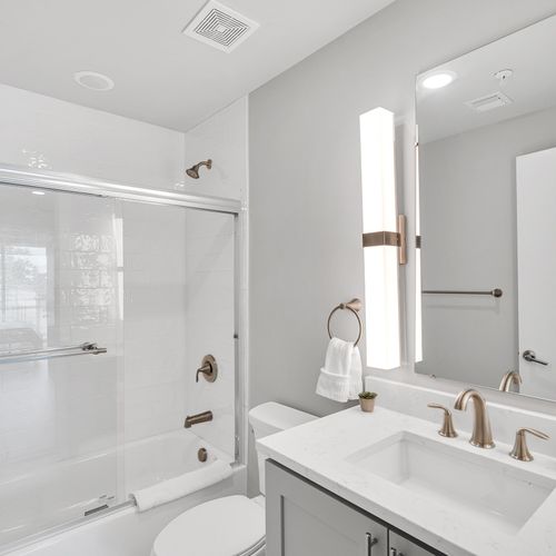 Modern bathroom with sleek fixtures and a refreshing ambiance.