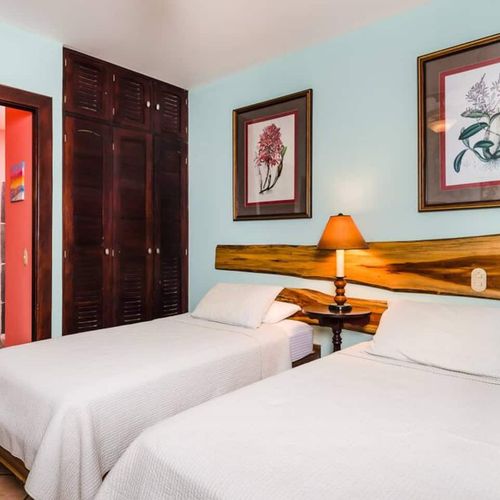 The beds can be pushed together to make a queen bed