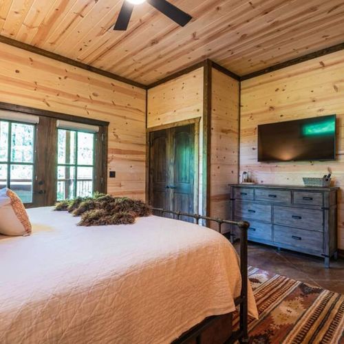 King Suite on the main level with outdoor access.