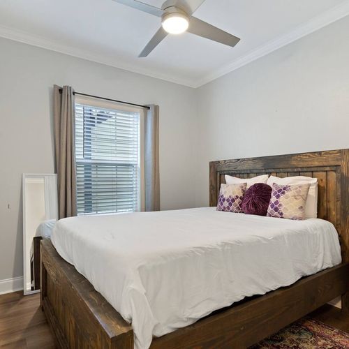 Second bedroom w/ queen bed & a full-body mirror to get ready in style.