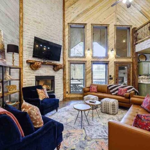 Towering ceilings adorned with hand-cut log beams awaiting your arrival.
