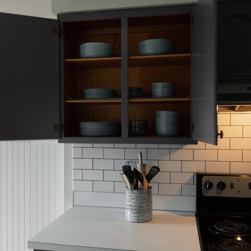 Our gourmet kitchen has beautiful dinnerware, serving ware, glasses for every occasion, and kitchen gadgets for baking and cooking any meal.