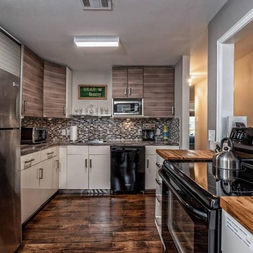Fully stocked kitchen with a stove/oven, microwave, refrigerator, dishwasher, toaster oven, 12 cup coffee pot and coffee is provided.