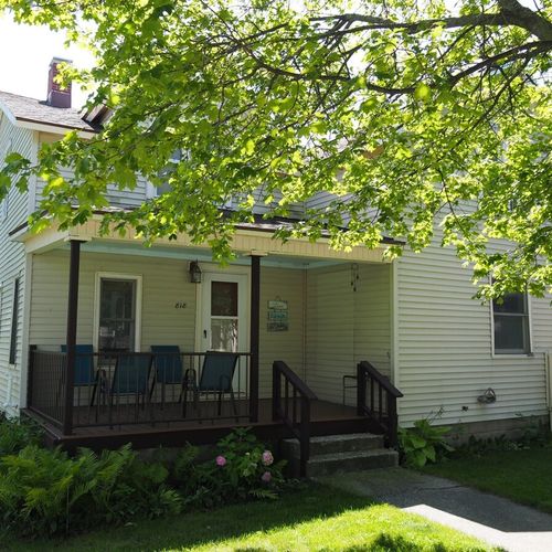 Overall:  the front of the house, highlighting the private front porch.