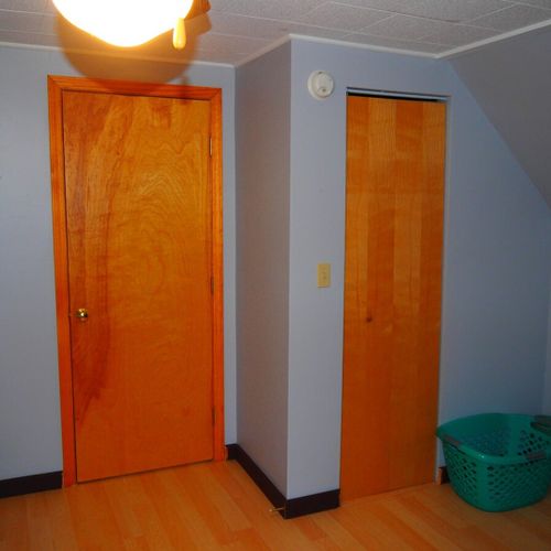Bedroom #3 (second floor):  includes a queen-size bed, a full-size bed, and a twin-on-full bunk bed. Also has a dresser. Closet, and ceiling fan.