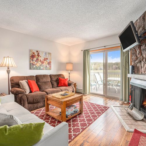 Sink into the plush sectional sofa after a day of mountain adventures.