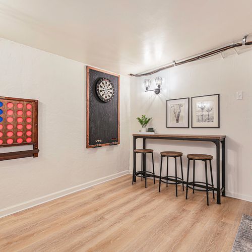 Kick back and relax with bar table seating over a game of darts and connect4.