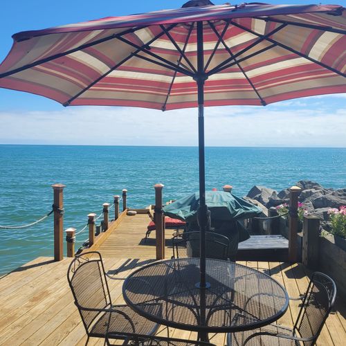 Exterior:  the outdoor dining furniture on the private deck