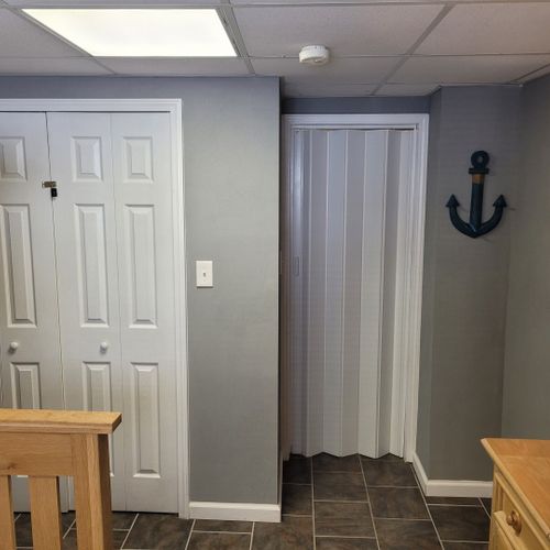 Bedroom:  cute bedroom with a twin-on-full bunk bed, electric heater, fan, 2 dressers, closet, lamp, and a television.
